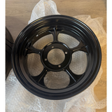 Two new Falcon rims, 3.50 x 12 inches. One comes with a new tire—see description