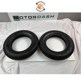 Deux pneus Michelin S83 3.50 x 10 pouces - d'occasion 